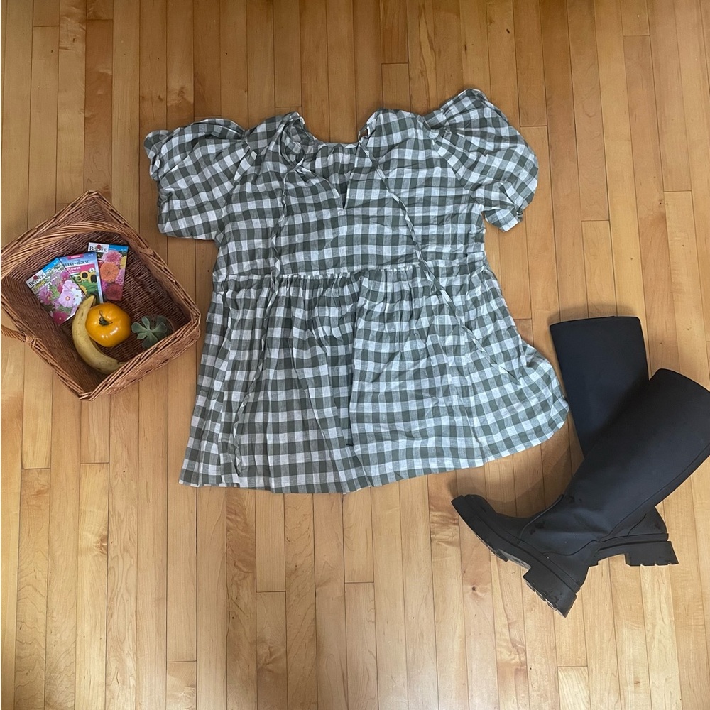 Adorable sage green, gingham baby doll dress. One size.